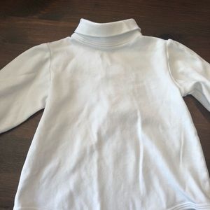 Bundle of white tops